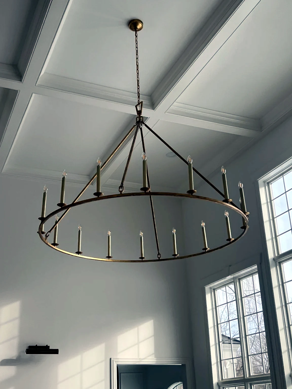 Coffered ceiling and tall windows