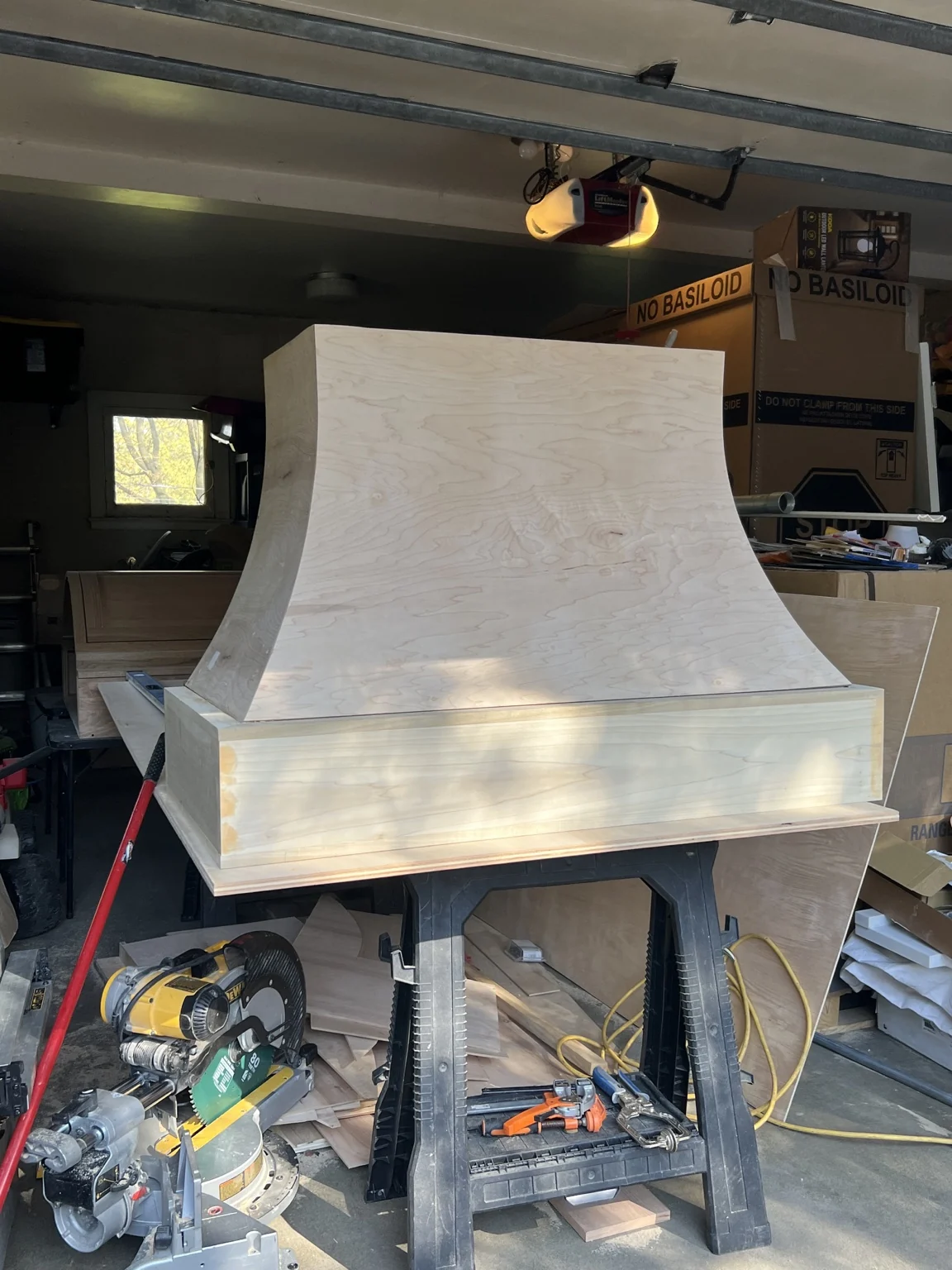 Raw wood hood assembled in the shop